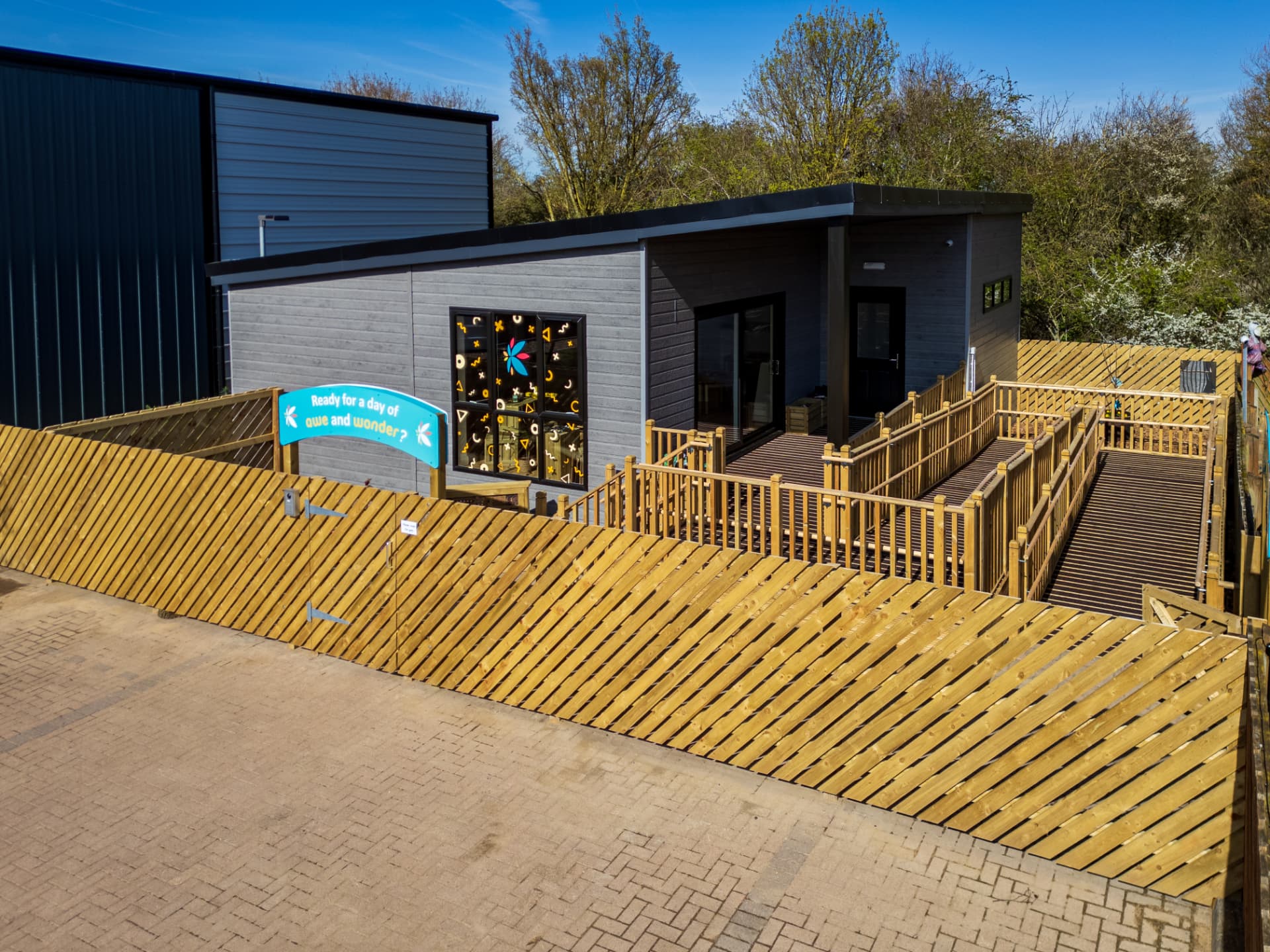 Aerial view of a completed modular nursery with play deck